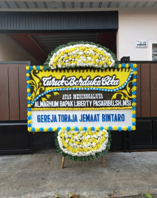 Papan Bunga Duka di Baru