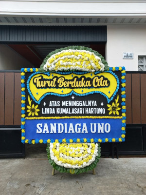 Papan Bunga Duka di Baru